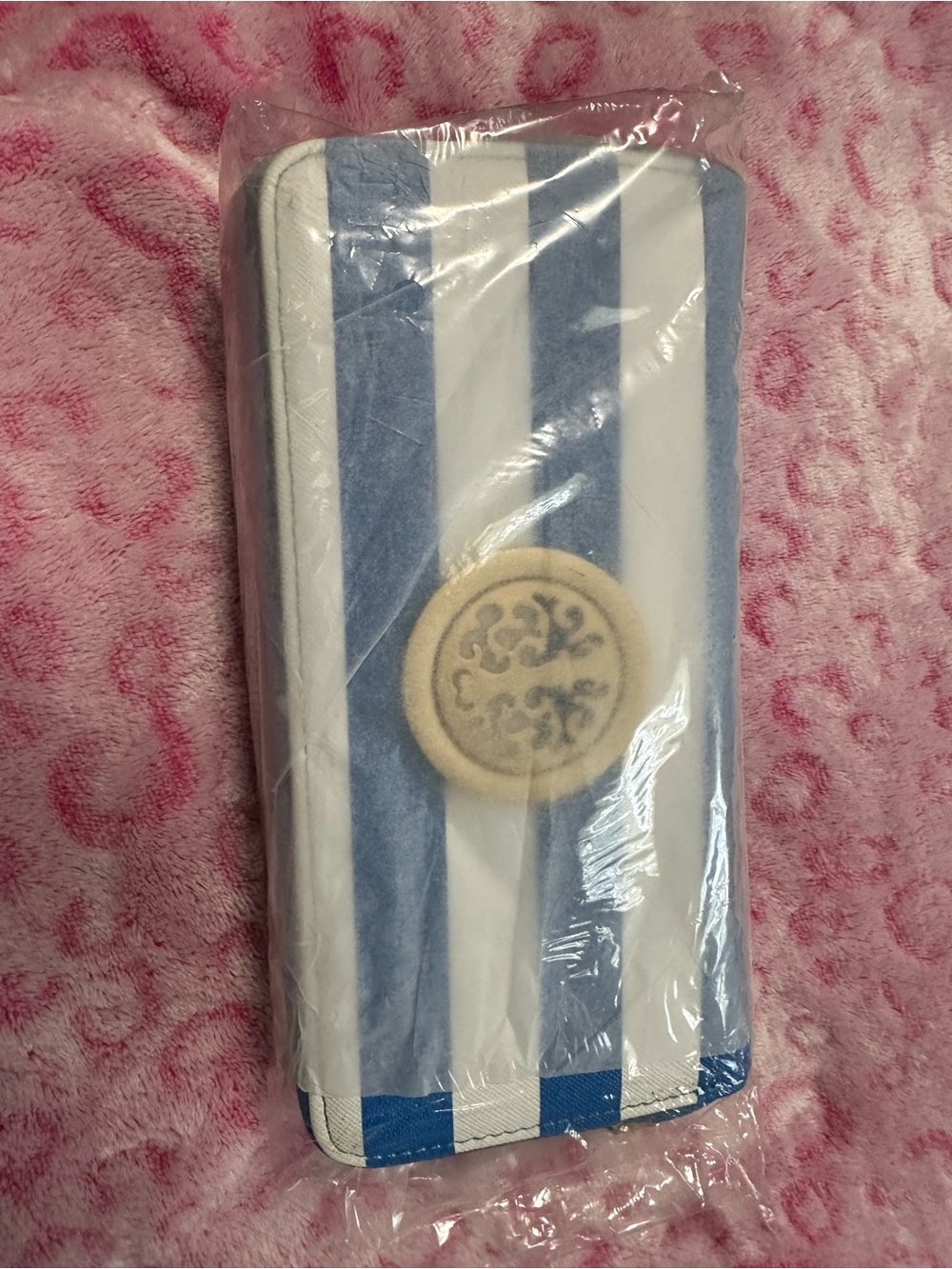 Striped Blue and White Wallet with Round Emblem